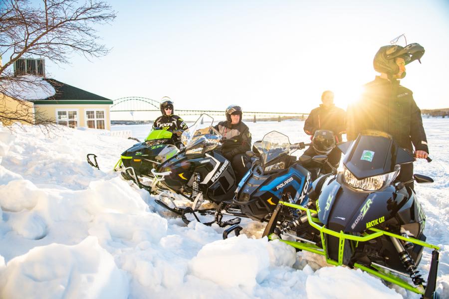 Snowmobiling along the Miramichi River
