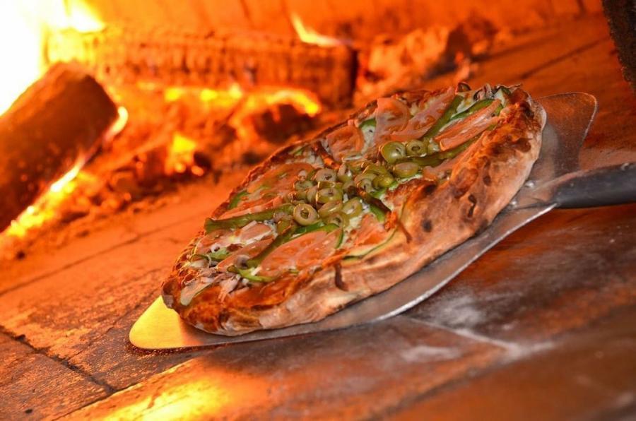 Nothing beats a wood-fired pizza on a cold winter night (or any night) Photo credit: @pizzapatrimoine