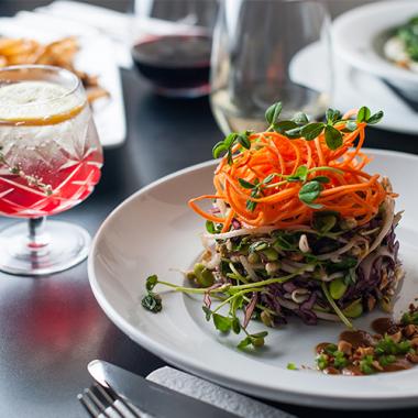 A photo of a salad at a high-end eatery.