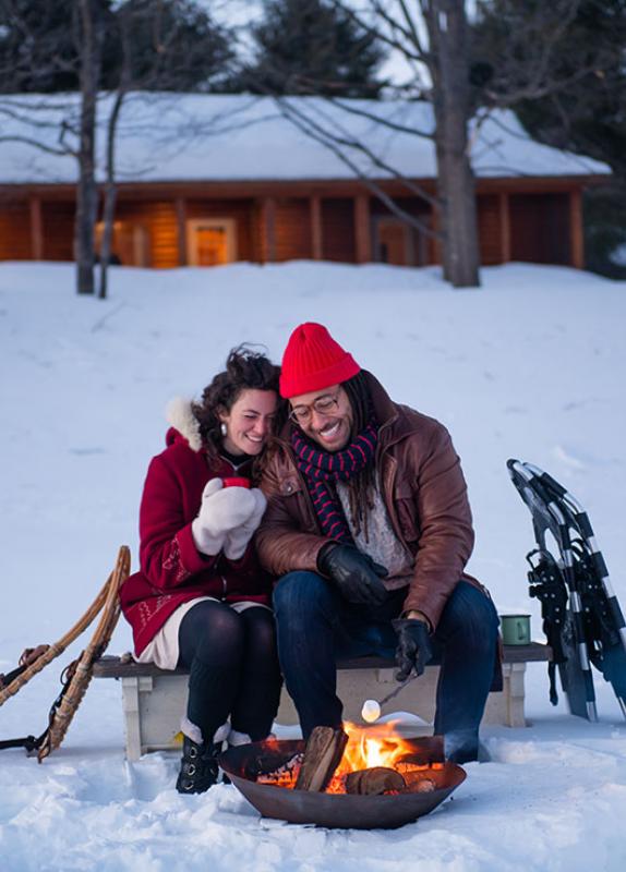 Warming up by the fire at Storeytown Cottages